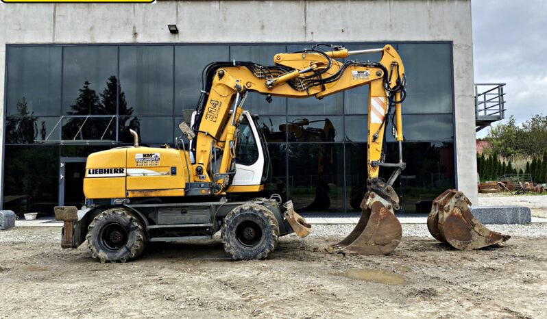 LIEBHERR A314 KOPARKA KOŁOWA. full