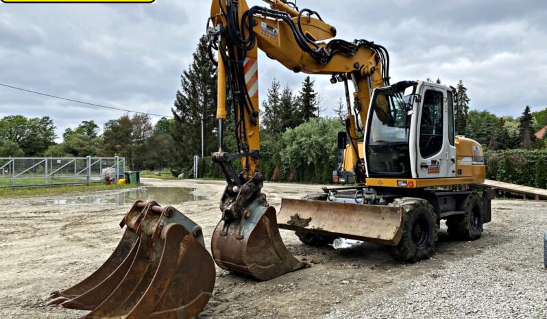 LIEBHERR A314 KOPARKA KOŁOWA. full