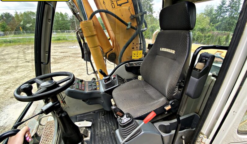 LIEBHERR A314 KOPARKA KOŁOWA. full