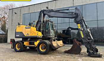 VOLVO EW 140 D KOPARKA KOŁOWA Z GŁOWICĄ OBROTOWA ZE SZCZYPCAMI full