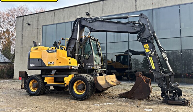 VOLVO EW 140 D KOPARKA KOŁOWA Z GŁOWICĄ OBROTOWA ZE SZCZYPCAMI full