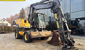 VOLVO EW 140 D KOPARKA KOŁOWA Z GŁOWICĄ OBROTOWA ZE SZCZYPCAMI full