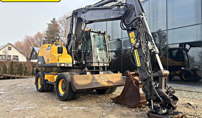 VOLVO EW 140 D KOPARKA KOŁOWA Z GŁOWICĄ OBROTOWA ZE SZCZYPCAMI full