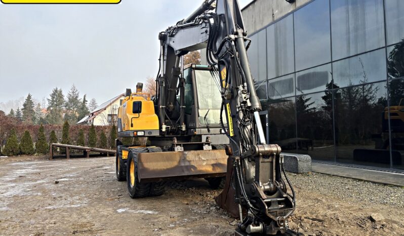 VOLVO EW 140 D KOPARKA KOŁOWA Z GŁOWICĄ OBROTOWA ZE SZCZYPCAMI full