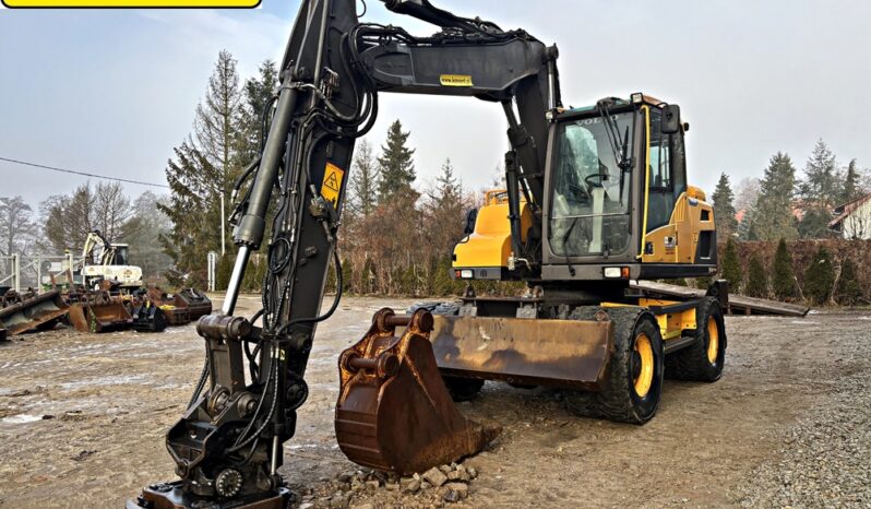 VOLVO EW 140 D KOPARKA KOŁOWA Z GŁOWICĄ OBROTOWA ZE SZCZYPCAMI full