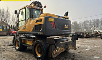 VOLVO EW 140 D KOPARKA KOŁOWA Z GŁOWICĄ OBROTOWA ZE SZCZYPCAMI full