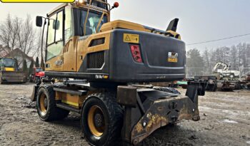 VOLVO EW 140 D KOPARKA KOŁOWA Z GŁOWICĄ OBROTOWA ZE SZCZYPCAMI full