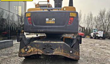 VOLVO EW 140 D KOPARKA KOŁOWA Z GŁOWICĄ OBROTOWA ZE SZCZYPCAMI full