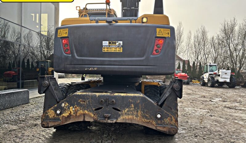 VOLVO EW 140 D KOPARKA KOŁOWA Z GŁOWICĄ OBROTOWA ZE SZCZYPCAMI full