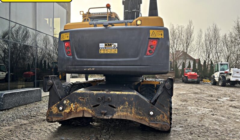 VOLVO EW 140 D KOPARKA KOŁOWA Z GŁOWICĄ OBROTOWA ZE SZCZYPCAMI full