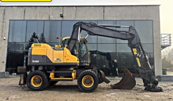 VOLVO EW 140 D KOPARKA KOŁOWA Z GŁOWICĄ OBROTOWA ZE SZCZYPCAMI full